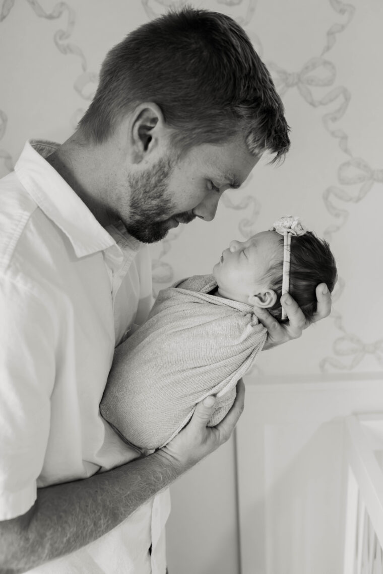 daddy and newborn baby girl photo